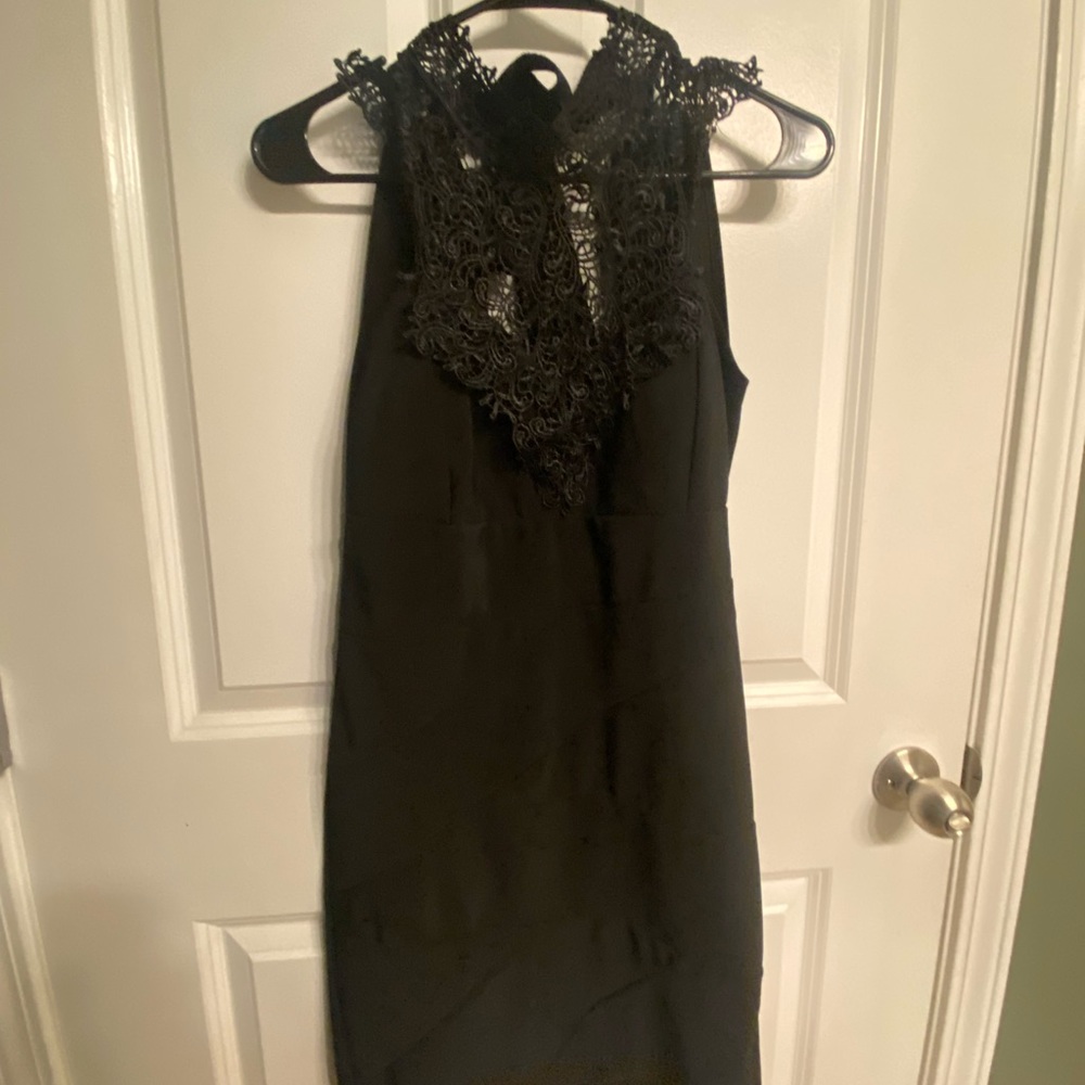 High neck lace top mini dress with tie back closure
